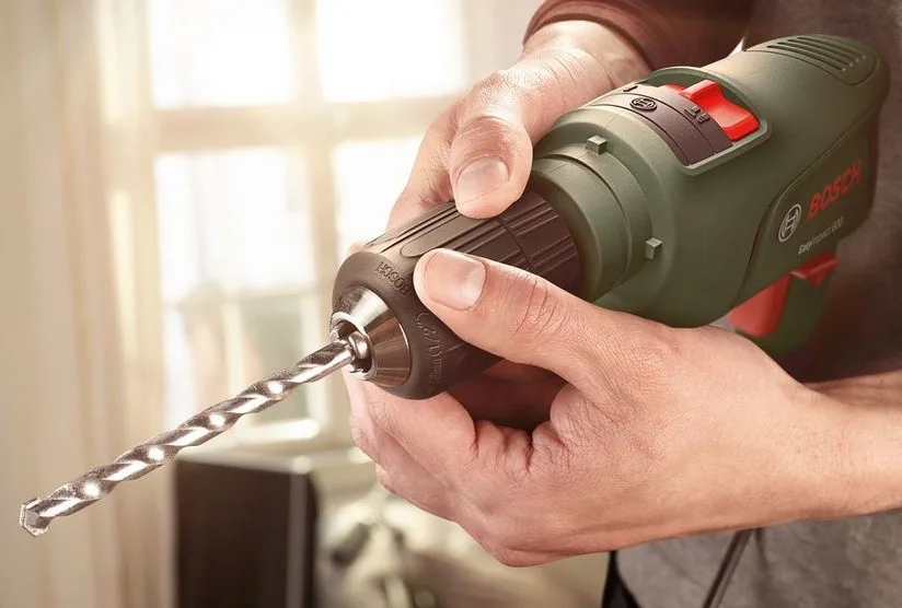 Ударна дриль Bosch EasyImpact 600 600 Вт швидкозажимна для домашнього використання свердління та буріння