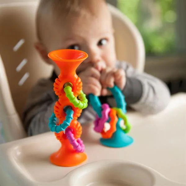 Прорізувач брязкальце Fat Brain Toys силіконовий 15х5 см помаранчевий