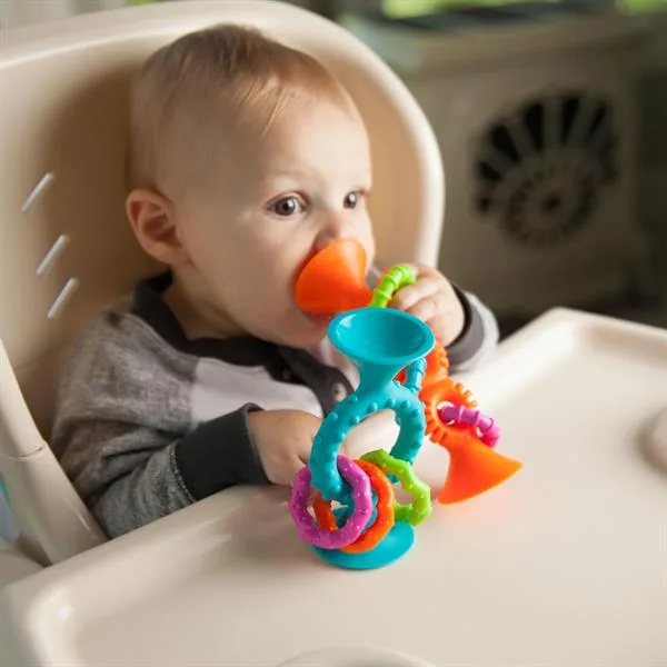 Прорізувач брязкальце Fat Brain Toys силіконовий 15х5 см помаранчевий