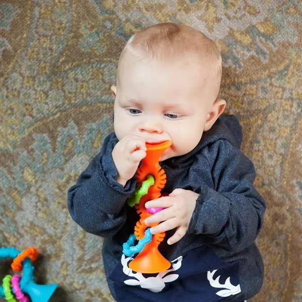 Прорізувач брязкальце Fat Brain Toys силіконовий 15х5 см помаранчевий