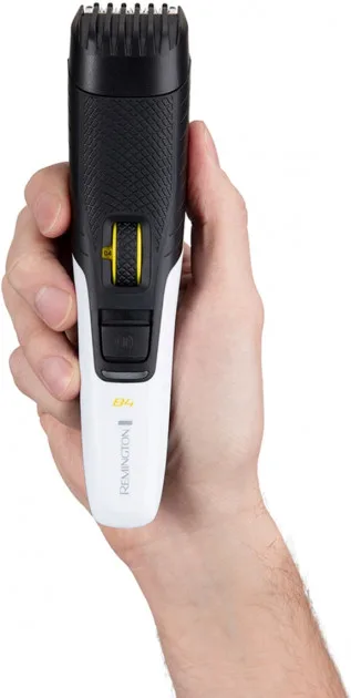 Тример Remington для бороди та вусів, акумуляторний, роторний двигун, металевий, чорно-білий.
