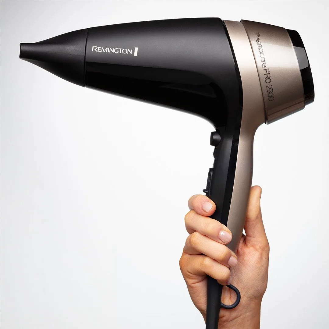 Фен Remington Thermacare Pro, мощностью 2100 Вт, с 3 режимами работы, диффузором, турмалиновой ионизацией и холодным обдувом, черно-коричневого цвета