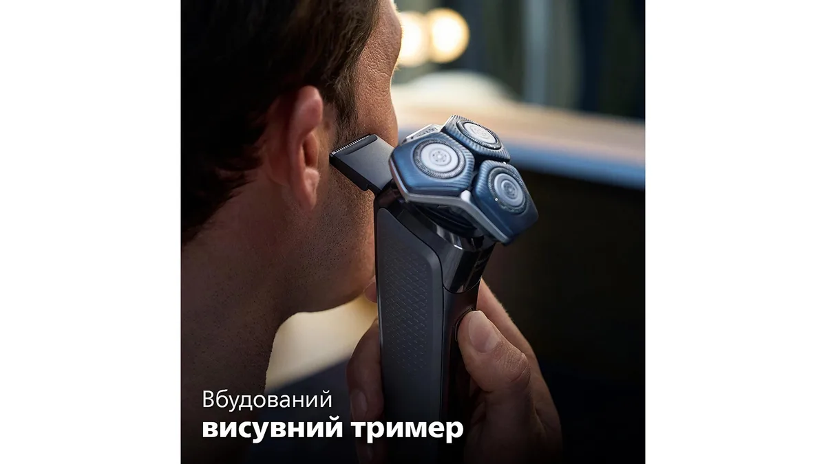 Електрична роторна бритва Philips Series 7000, 3 бритвені головки, Li-Ion акумулятор, для сухого та вологого гоління, з тримером т