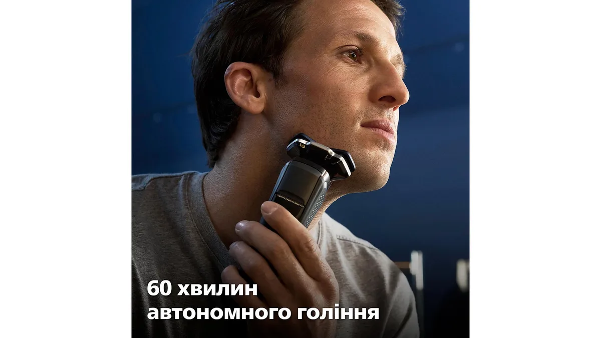 Електрична роторна бритва Philips Series 7000, 3 бритвені головки, Li-Ion акумулятор, для сухого та вологого гоління, з тримером т