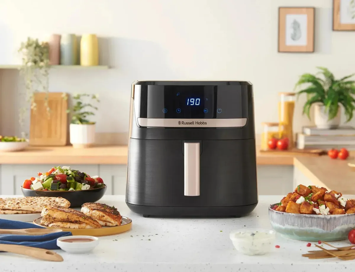 Мультифункційна піч Russell Hobbs 1800Вт, ємність 8.3л, сенсорне керування, 9 автоматичних програм, пластиковий корпус, чорний кол