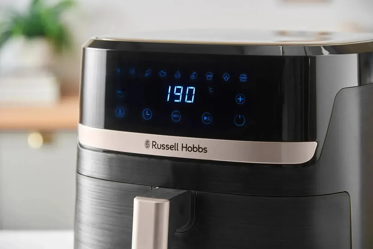 Мультифункційна піч Russell Hobbs 1800Вт, ємність 8.3л, сенсорне керування, 9 автоматичних програм, пластиковий корпус, чорний кол