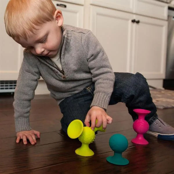 Набір сенсорних брязкалець Fat Brain Toys силіконові 23х6х25 см різнокольорові 3 шт