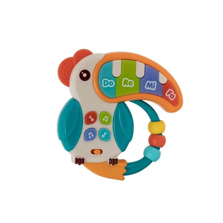 Детская музыкальная игрушка BABY TEAM пластик 9 месяцев Тукан цветной с световыми эффектами