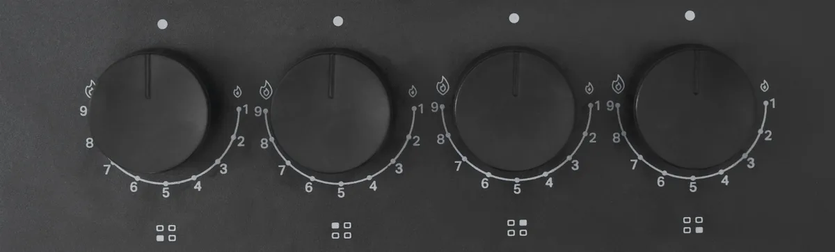 Газова варильна поверхня Whirlpool емаль 58х5,1х51 см чорна 4 конфорки
