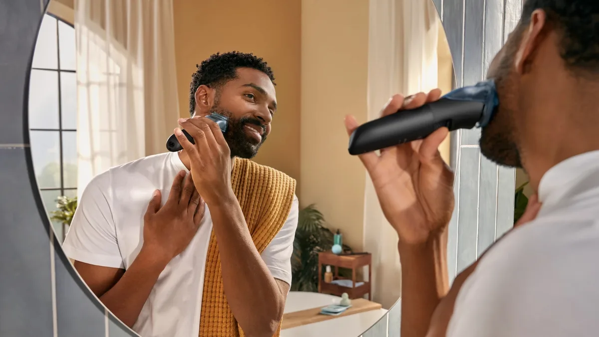 Тример Philips Series 5000 для бороди та вусів, акумуляторний, з нержавіючої сталі, чорний.
