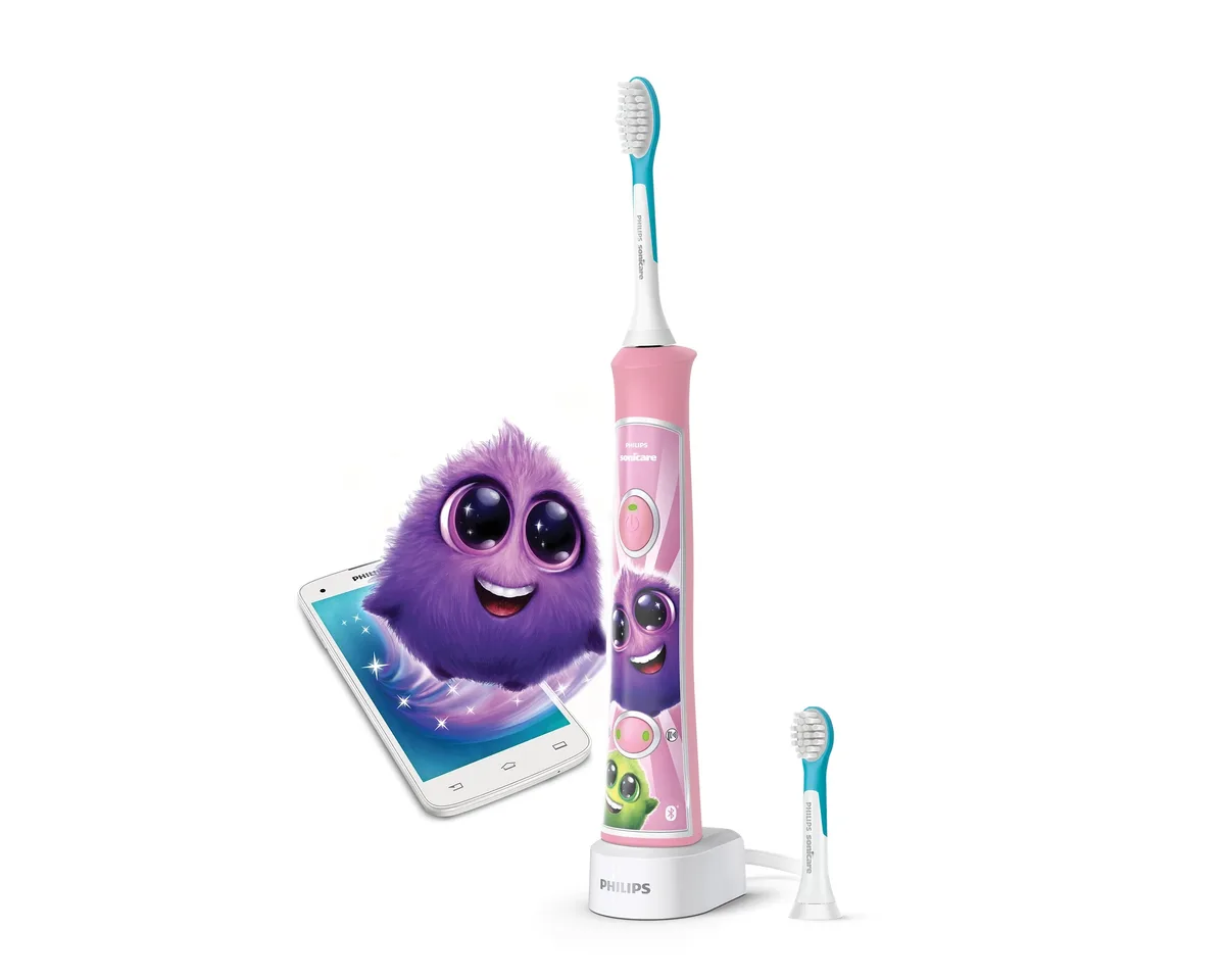 Електрична зубна щітка Philips Sonicare для дітей, 62 тис. коливань/хв, 2 насадки, Bluetooth, рожевого кольору.