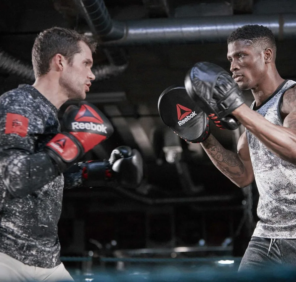 Боксерські рукавиці Reebok шкіра 10 унцій чорні червоні