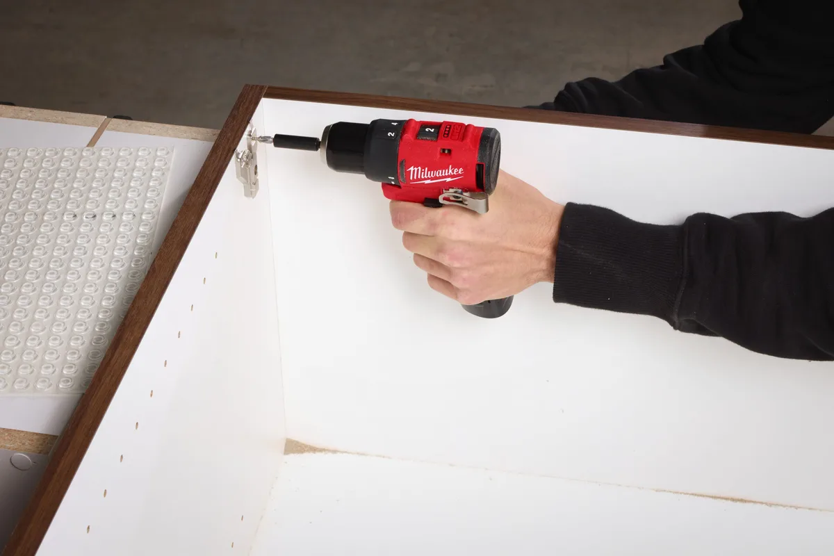 Акумуляторний шуруповерт-дриль Milwaukee M12 BLDDRC-202C 12В 2х2А·год 40Нм 0-550-1700об/хв ЗП C12C в кейсі, вага 1.2кг.