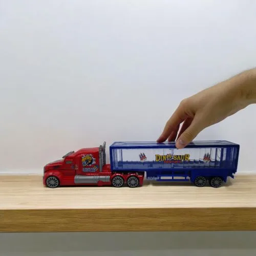 Трейлер-трансформер Fengfa Toys Динозаври з ефектами світла і звуку для дітей 3+