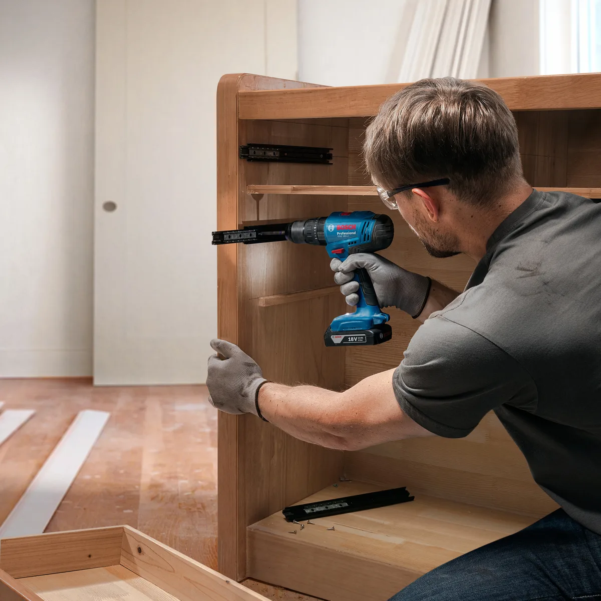 Акумуляторний ударний шурупокрут-дриль Bosch Professional GSB 183-LI 18В, 2х2А·год, 21-56Нм, 374-1815об/хв, у кейсі.