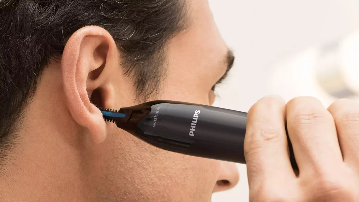 Тример Philips Series 1000 для носа та вух, живлення від 1 батареї AA, сталевий, чорного кольору.